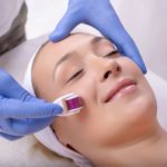 Woman getting microblading facial