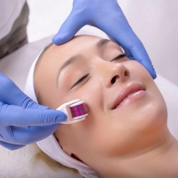 Woman getting microblading facial